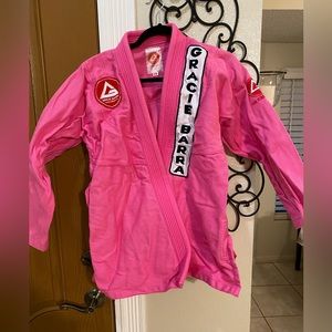 Lightly used pink Gracie Barra F2 kimono gi